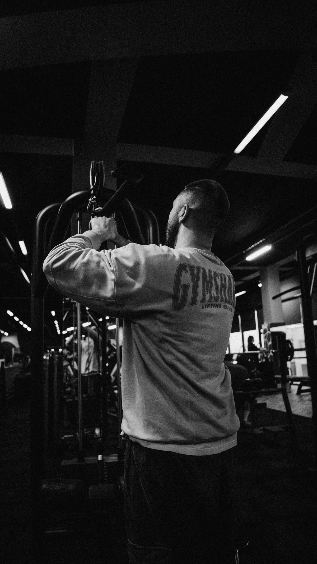 Illustrative athlete performing strength training in a gym